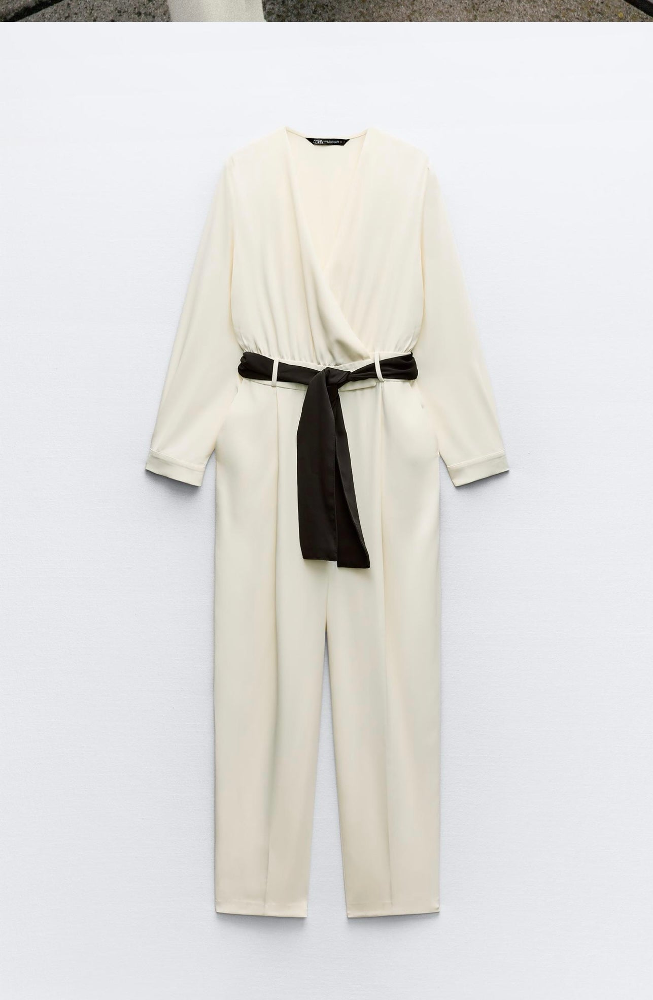 Elegant White Wrap Jumpsuit with Black Belt