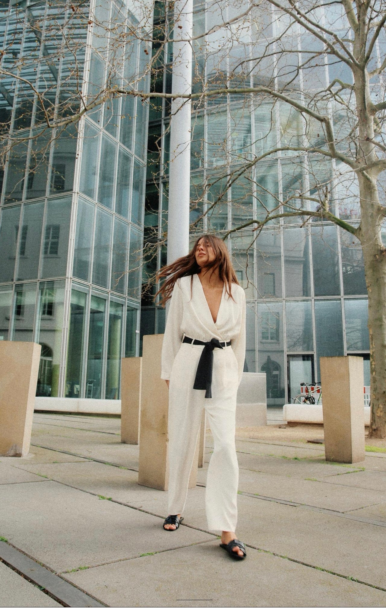 Elegant White Wrap Jumpsuit with Black Belt