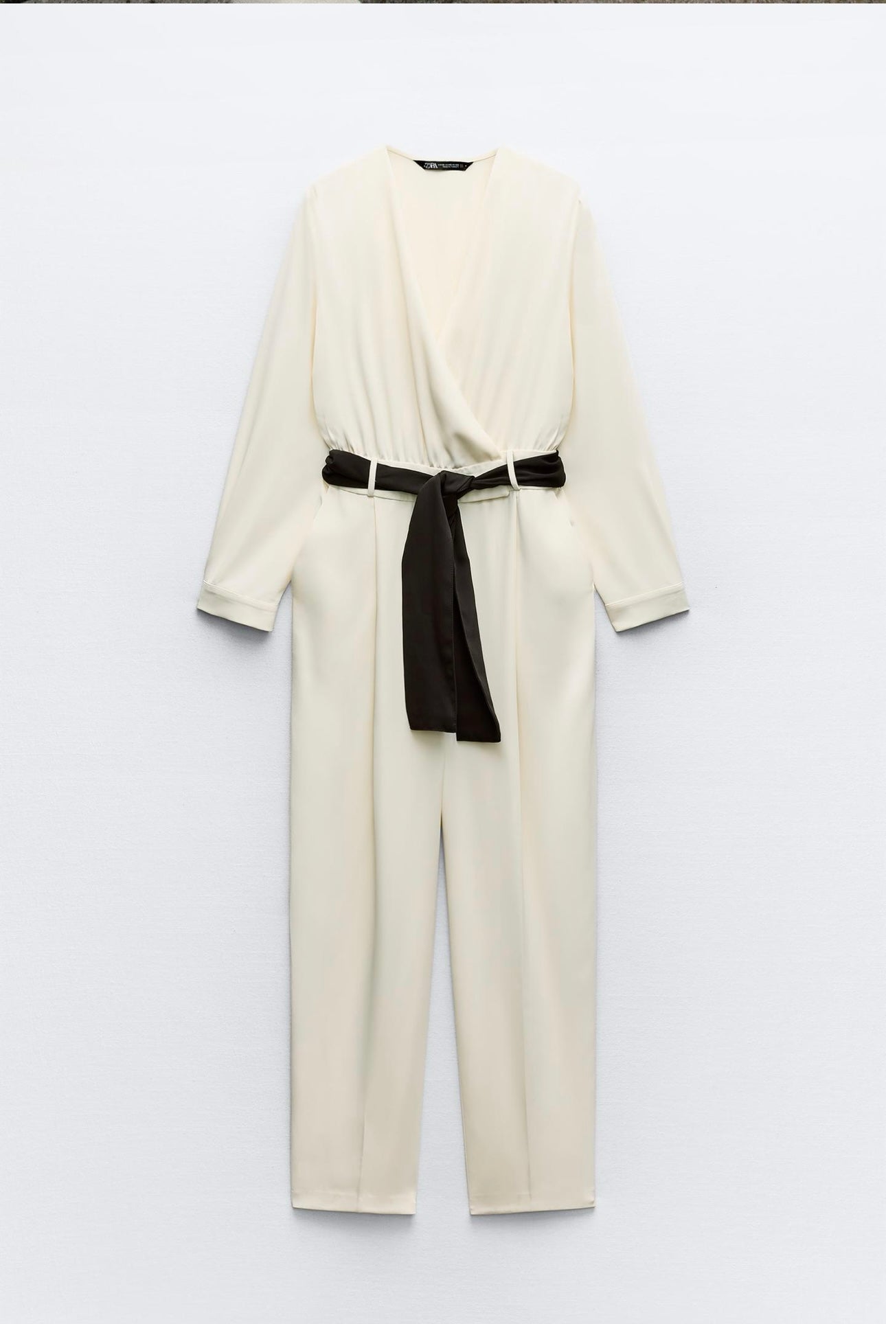 Elegant White Wrap Jumpsuit with Black Belt